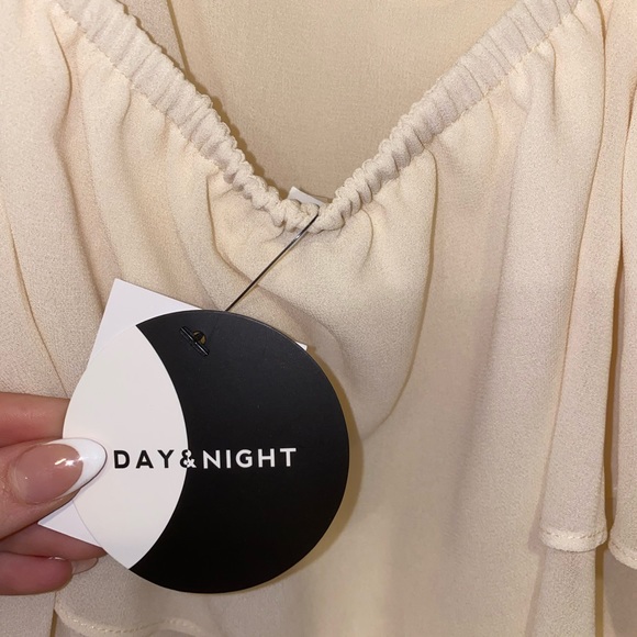 A cream flowy romper, size small - Picture 3 of 3